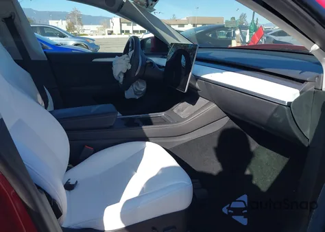 2023 Tesla Model Y Awd/Long Range Dual Motor All-Wheel Drive z USA, uszkodzony, nr VIN 7SAYGDEE4PF623615